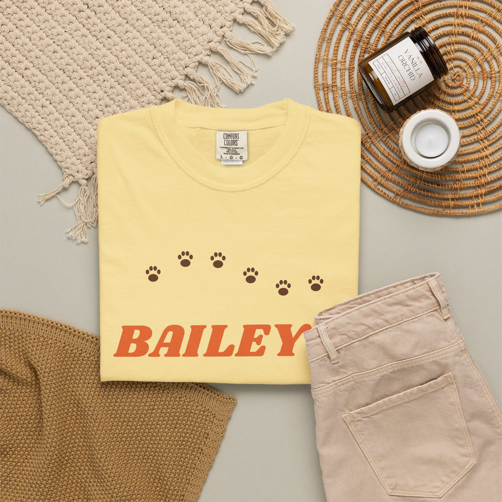 Tee printed with BAILEY'S in orange retro letters over FAVORITE HUMAN with a brown paw print trail, view 9
