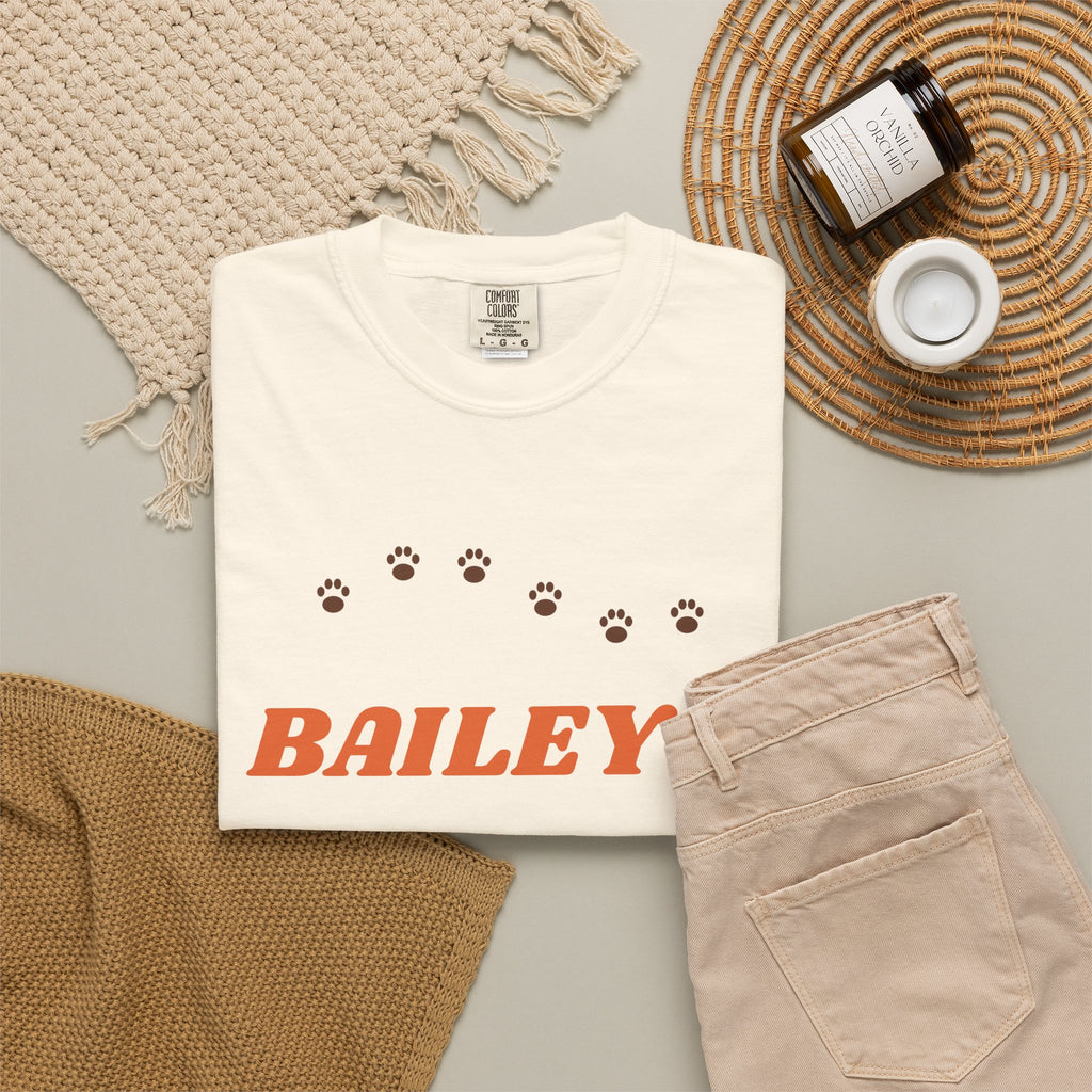 Tee printed with BAILEY'S in orange retro letters over FAVORITE HUMAN with a brown paw print trail, view 6